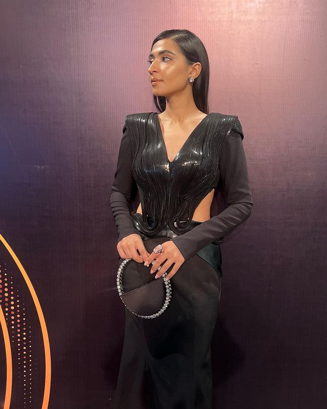 Mehek Saeed with Black Eternity Clutch