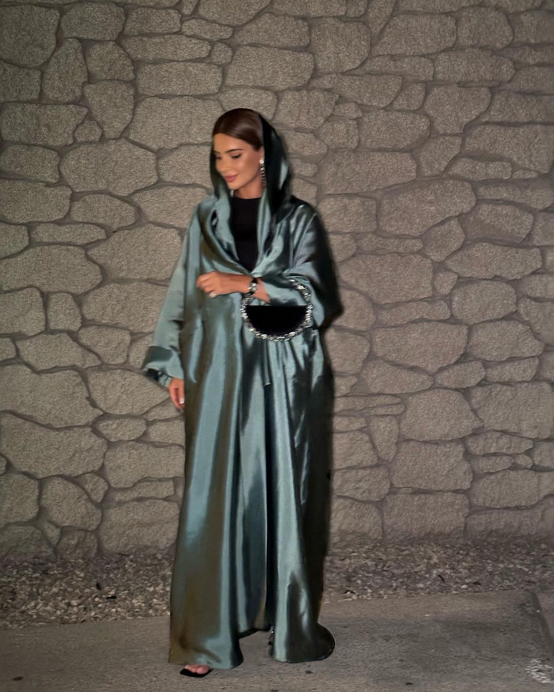 Fatma Husam with the Black Taliya Eternity Clutch