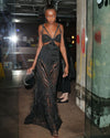 Leomie Anderson with BLACK ETERNITY CLUTCH