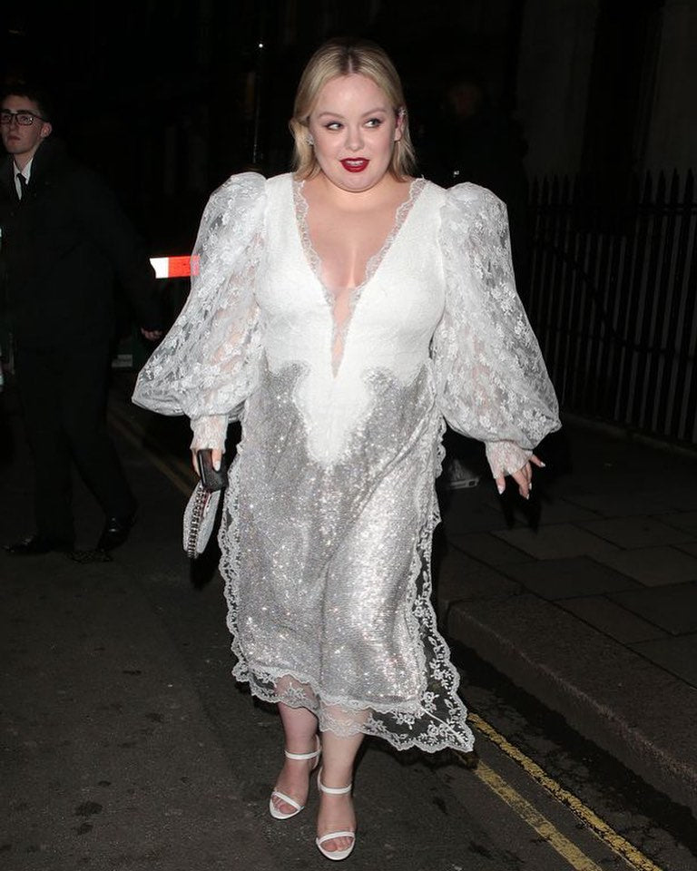 Nicola Coughlan with SILVER METALLIC ETERNITY CLUTCH