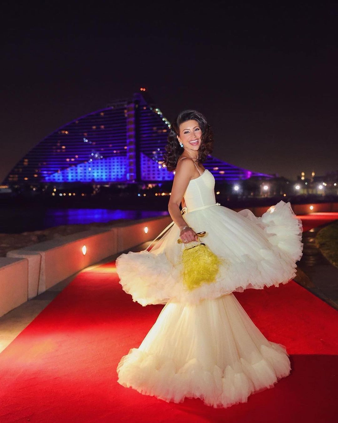 Maya Williams with YELLOW JASMINA FLAMINGO BAG