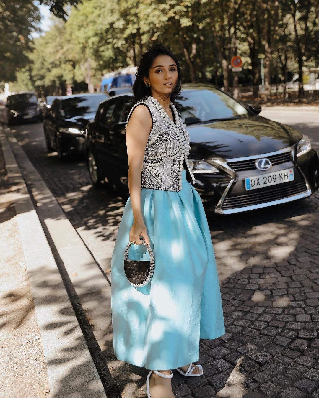 Masoom Minawala Mehta with Black Woven Eternity Clutch