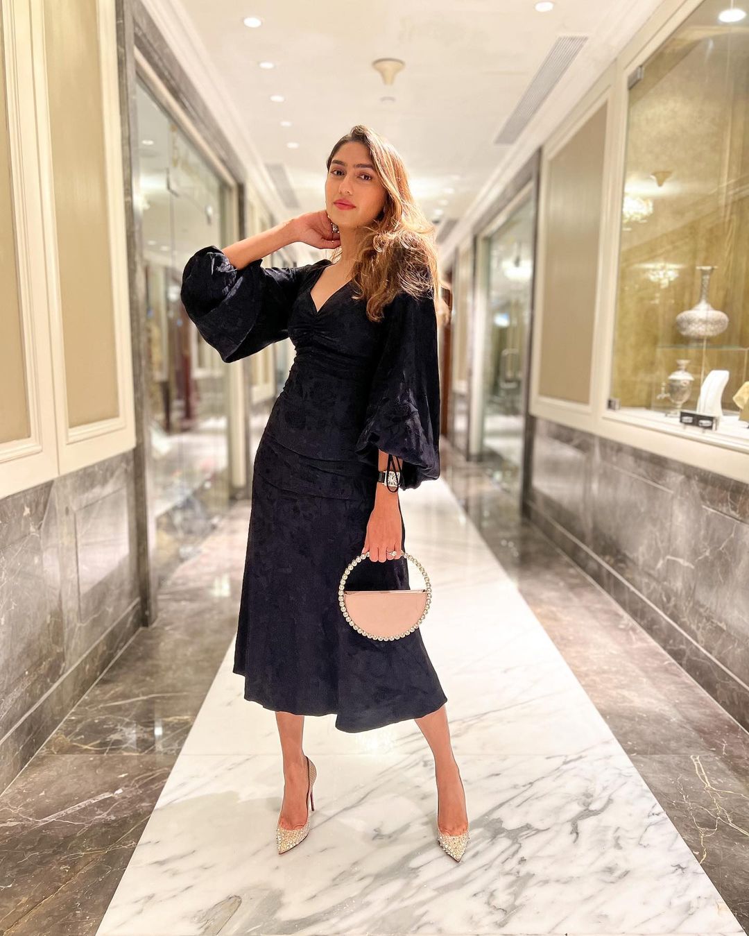 Isha Sutaria with Nude Eternity Clutch