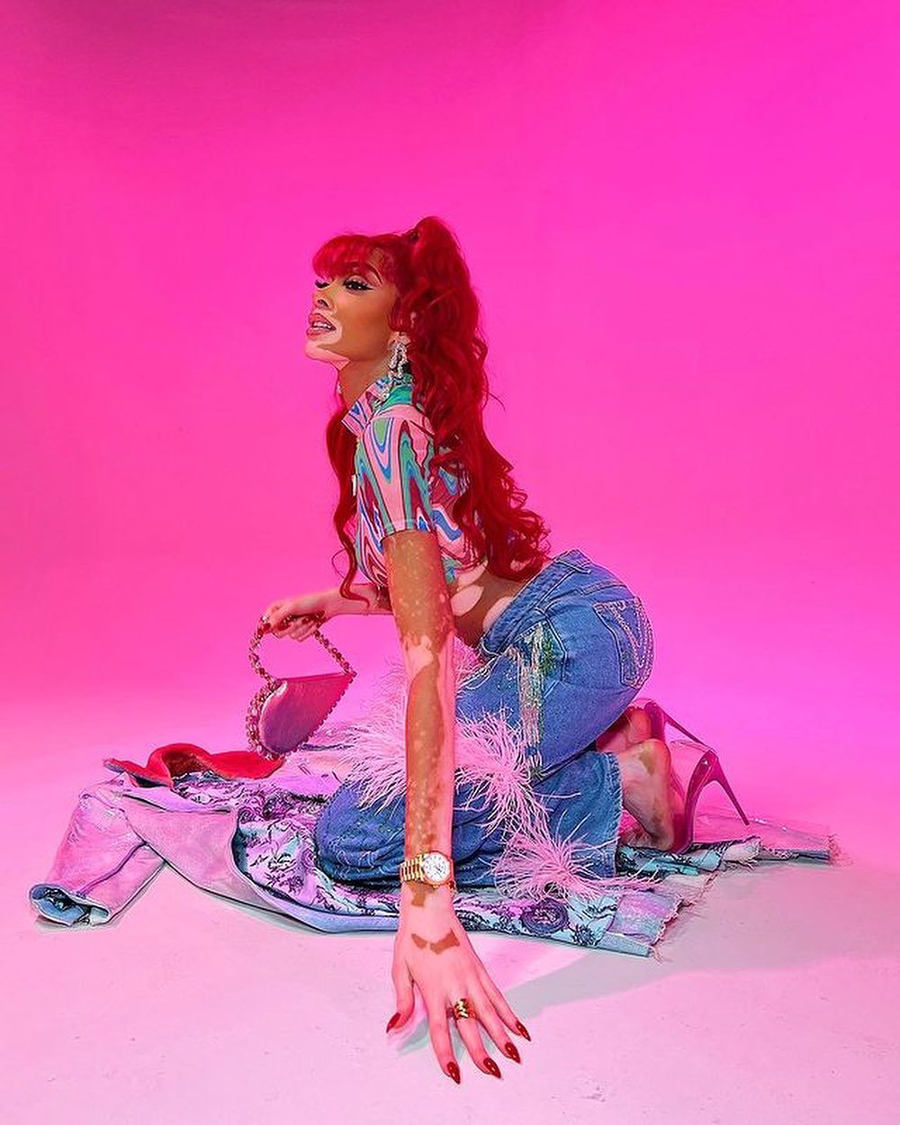 Winnie Harlow with the Candy Love Clutch