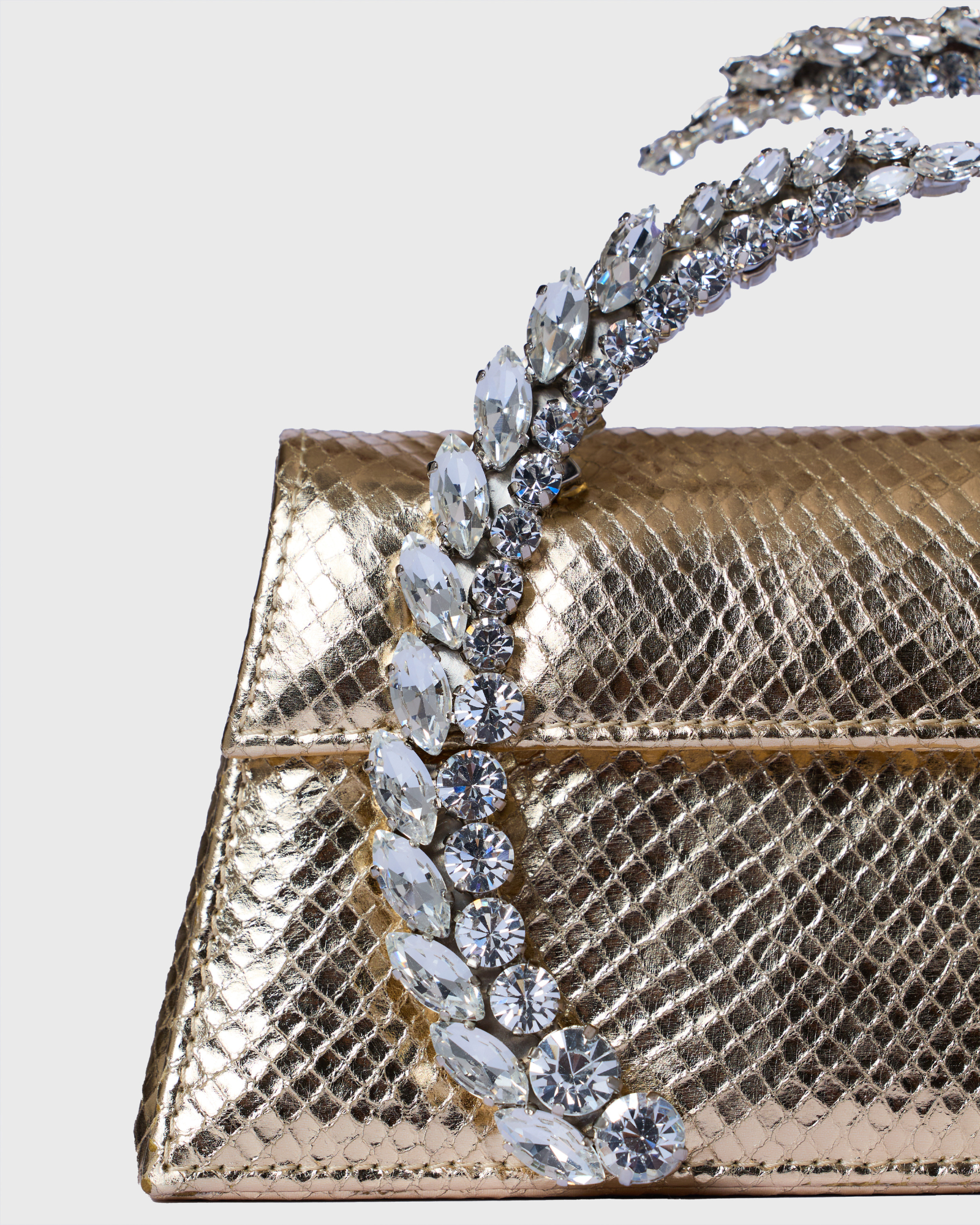 Gold Embossed Karma Clutch