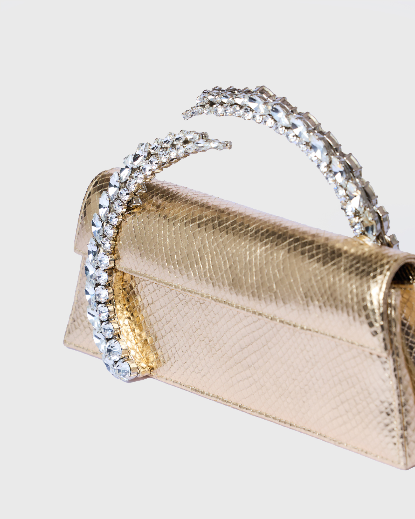 Gold Embossed Karma Clutch